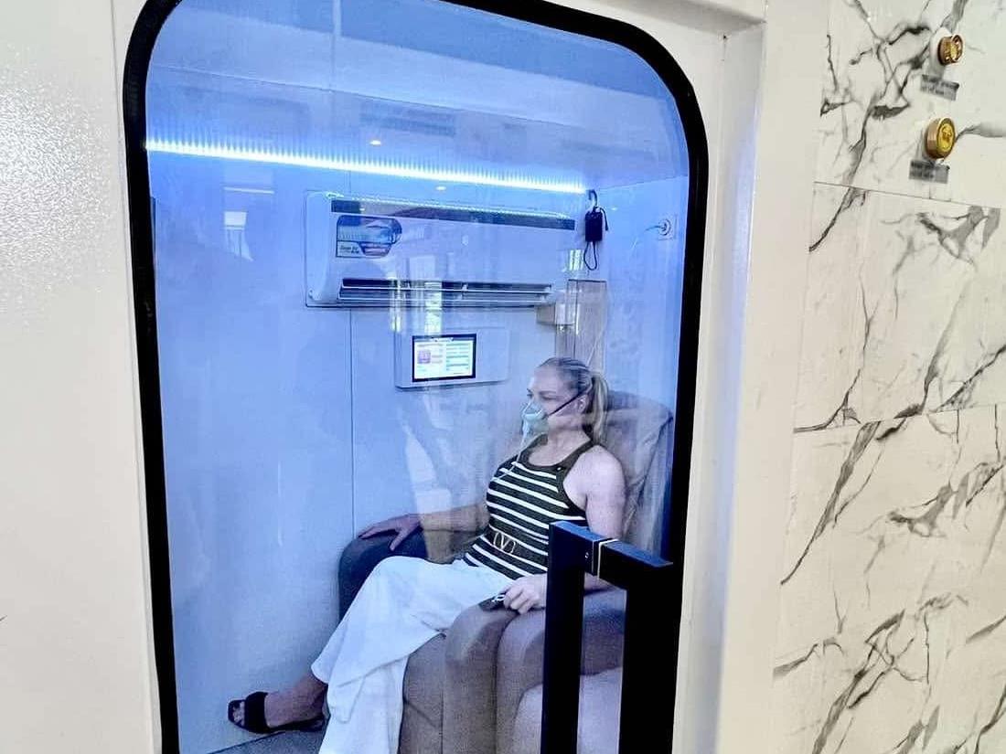 Patient inside hyperbaric oxygen chamber